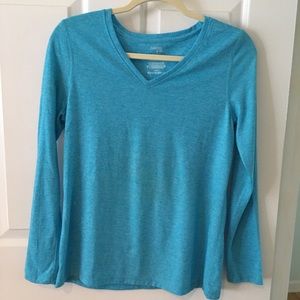 Danskin turquoise workout top.